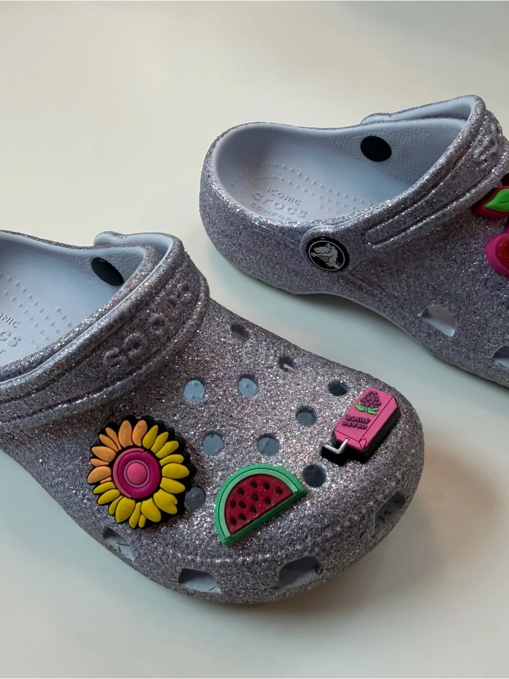 CROCS Kids Silver Glitter Clogs with Colorful Charms